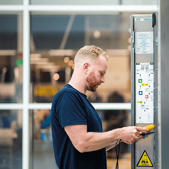 lift engineer repairing lift