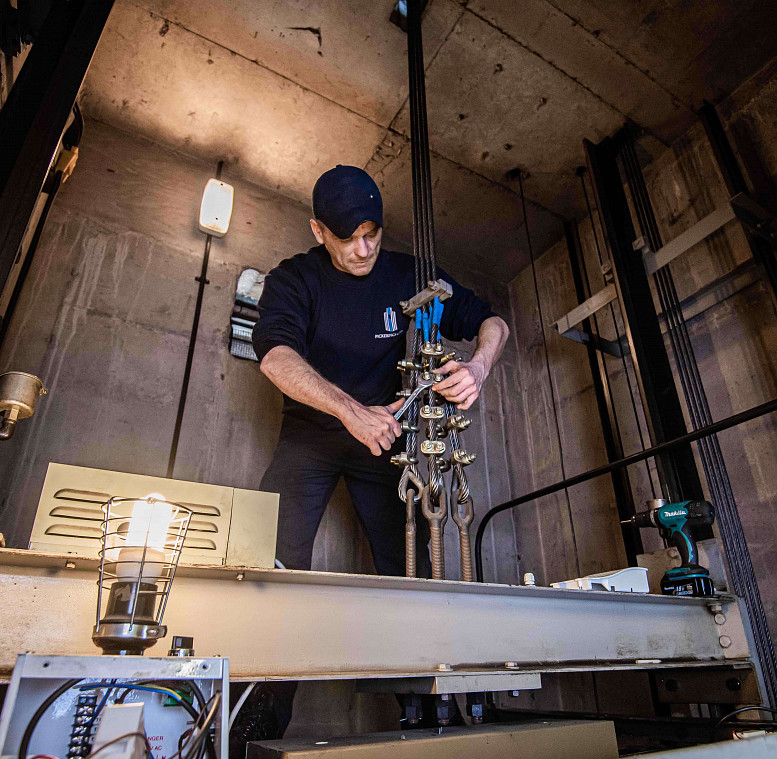 pickerings lifts engineer repairing lift