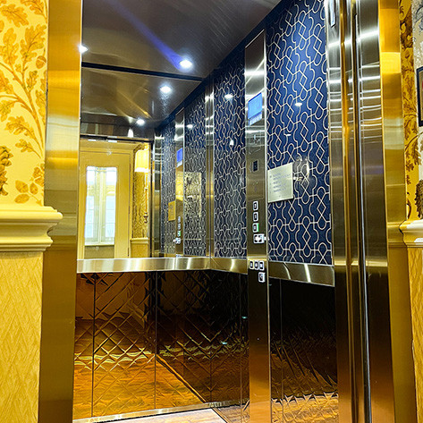 inside luxury passenger lift blue and gold