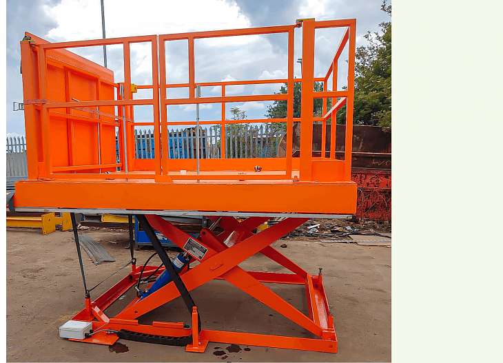 Orange scissor lift refurbishment after