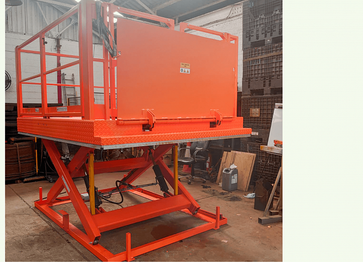 Refurb of orange scissor lift after